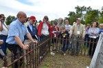 Peter Roloff shares story at the gravesite of Paul Follenius at Lake Creek